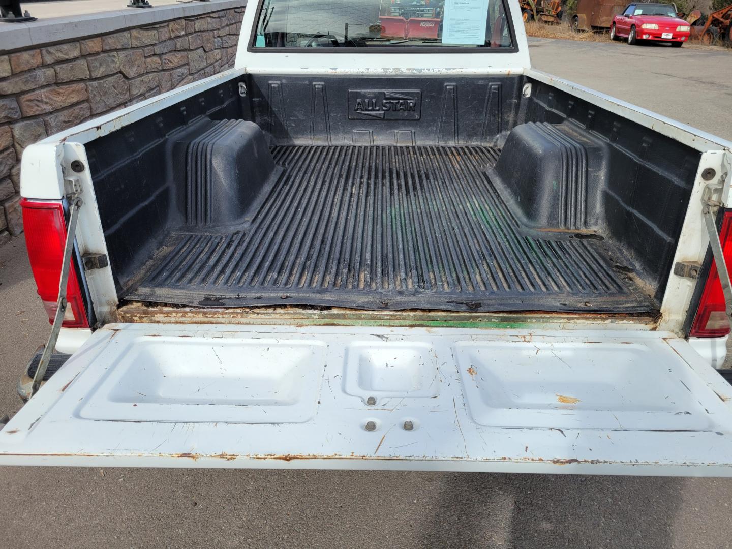 1991 White /Red GMC Sonoma Special (1GTCS14E9M8) with an 2.5L I4 engine, 5 Speed manual transmission, located at 450 N Russell, Missoula, MT, 59801, (406) 543-6600, 46.874496, -114.017433 - 2.5L I4 Engine. 5 Speed Manual Transmission. Runs and Drives well. Financing NOT Available on this Vehicle. - Photo#6